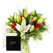 A striking bouquet unfolds with the refined purity of white lilies and the fervent red of classic roses. The composition balances bold and serene, lilies at the heart, their satin petals catching soft morning light and floating above a halo of lush green foliage. The roses nestle among the blooms with velvety intensity, their red tones deep and warm, evoking admiration and gratitude. Hints of eucalyptus and wispy grasses weave through the arrangement, adding movement and a fresh herbal whisper that lingers in the air. The whole bouquet rests in a natural, airy rhythm, a quiet celebration of strength and tenderness. Unopened buds hint at future beauty, promising ongoing delight when this gift blooms further in Stanmore living rooms, bedrooms, or a welcoming hallway along The Broadway.

The scent is a subtle duet of pure lily fragrance and romantic rose sweetness, never overpowering, but inviting a lingering inhale. The design feels both contemporary and timeless, a bouquet that can mark a milestone, express heartfelt thanks, or honor a local hero with equal sincerity. The card attached bears a hero theme, an intimate note of respect for someone who has inspired others. This arrangement would be ideal for anniversaries, achievements, or simply to say you see someone remarkable. Available for same day delivery across Stanmore, this floral gesture carries the trust and warmth of a trusted local florist, here to support the community. Flower Delivery Stanmore is proud to bring this moment to doorsteps near Stanmore Village and beyond.